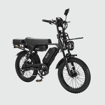 OUXI V8 Ultra Max electric fat bike in black, front three-quarter view with LED headlight and front cargo rack, Inner City Scooters Dublin